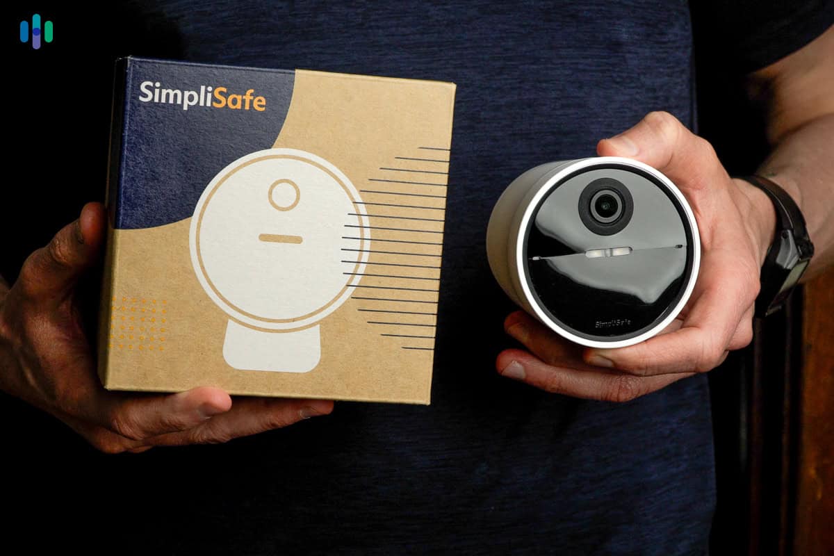 SimpliSafe System Outdoor Camera in hand SimpliSafe System Outdoor Camera in hand